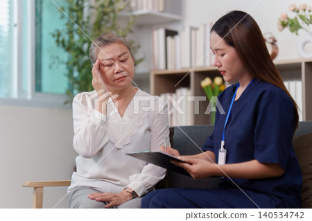 Nurse consulting elderly woman about health concerns Nurse consulting elderly woman about health concerns 140534742
