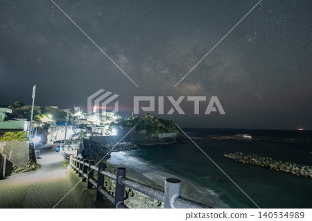 A port town with a lighthouse and the Milky Way - Mie Prefecture A port town with a lighthouse and the Milky Way - Mie Prefecture 140534989