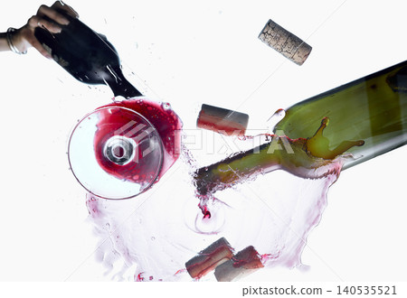 Red wine splash with bottle corks and glass top view isolated on white background Red wine splash with bottle corks and glass top view isolated on white background 140535521