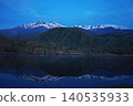 Before dawn at Ichinose Park in Norikura Highlands, a view of Mount Norikura reflected in the water from Maime Pond. 140535933