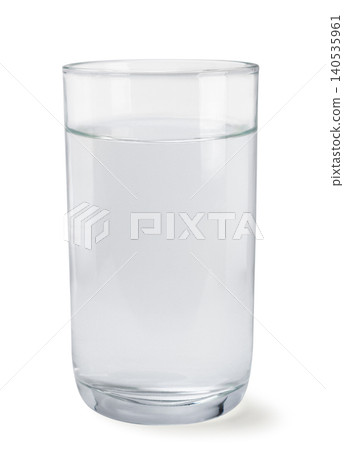 Glass of clean water close-up on a white background. Isolated Glass of clean water close-up on a white background. Isolated 140535961