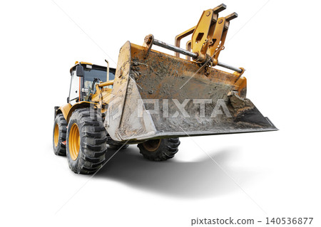 A universal excavator-loader is ready for use at a construction site. It is located in an outdoor area, prepared for loading and digging tasks 140536877