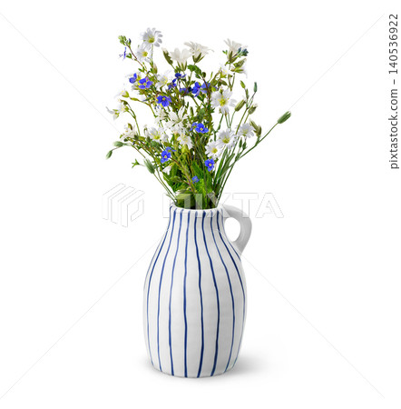 Elegant ceramic vase with wildflowers bouquet isolated on white background Elegant ceramic vase with wildflowers bouquet isolated on white background 140536922