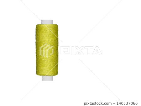 yellow spool of sewing thread isolated on white background 140537066