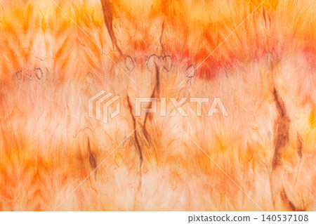 abstract pattern on silk fabric texture in yellow and brown tones 140537108