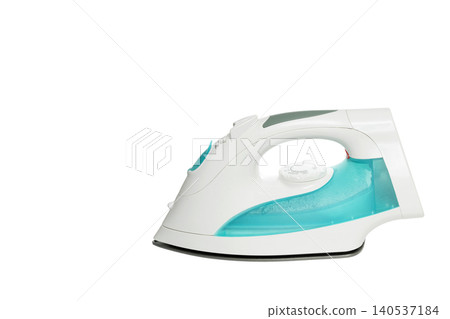 horizontal cordless iron of turquoise color on the right side on white background horizontal cordless iron of turquoise color on the right side on white background 140537184