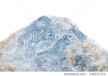 Macro mineral stone Celestine in the breed a white background Macro mineral stone Celestine in the breed a white background 140537334