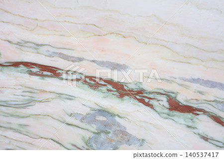 Colorful stone surface with different patterns and hues in a natural setting Colorful stone surface with different patterns and hues in a natural setting 140537417