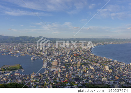 The city of Hakodate and the Tsugaru Strait as seen from the Hakodateyama Observatory: A breathtaking view representative of Hokkaido. The city of Hakodate and the Tsugaru Strait as seen from the Hakodateyama Observatory: A breathtaking view representative of Hokkaido. 140537474