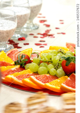 Fresh fruit platter with citrus, grapes and strawberries Fresh fruit platter with citrus, grapes and strawberries 140537672