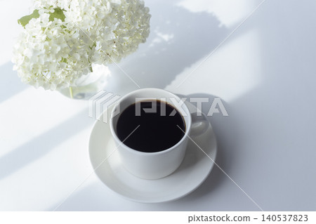 A refreshing morning with Annabelle hydrangeas and black coffee. 140537823