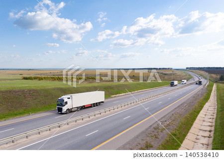 Trucks with trailers on the highway. Aerial view 140538410
