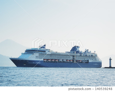 Shizuoka Prefecture: The Celebrity Millennium enters port amid the morning mist. (May) 140539248