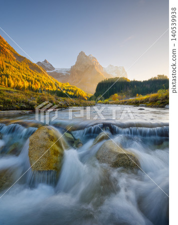 Rosenlaui, Bernese Oberland region in Switzerland valley at sunset. Rosenlaui, Bernese Oberland region in Switzerland valley at sunset. 140539938