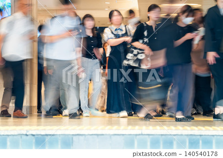 Commuter rush hour, Shinjuku Station, Tokyo Commuter rush hour, Shinjuku Station, Tokyo 140540178