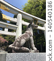 The torii gate and wolf statue at Mitsumine Shrine 140540186