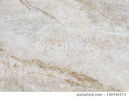 Surface of light marble with subtle patterns showing texture and color variations in a bright setting Surface of light marble with subtle patterns showing texture and color variations in a bright setting 140540373