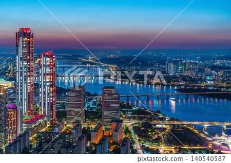 High-angle panoramic view of Yeouido financial district skyscrapers at sunset in Seoul, South Korea. 140540587
