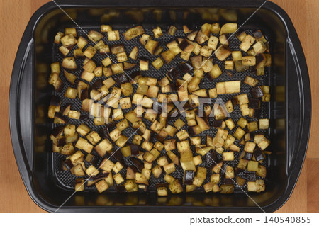 Roasted, diced eggplants Roasted, diced eggplants 140540855