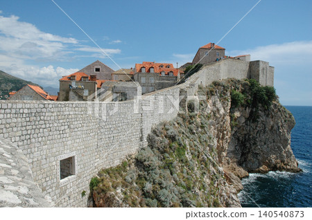 The Medieval City Walls of Dubrovnik on a Steep Cliff The Medieval City Walls of Dubrovnik on a Steep Cliff 140540873