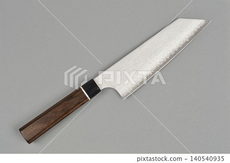 Japanese damascus steel kitchen knife on gray background Japanese damascus steel kitchen knife on gray background 140540935