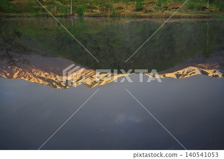 Norikura Plateau, Ichinose Park at sunrise; Mt. Norikura reflected in Maime Pond. Norikura Plateau, Ichinose Park at sunrise; Mt. Norikura reflected in Maime Pond. 140541053