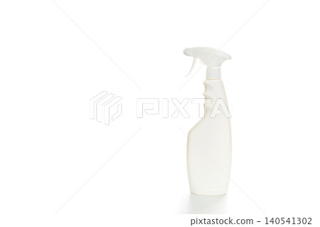 white plastic spray bottle stands on a light background on the right side white plastic spray bottle stands on a light background on the right side 140541302
