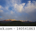 Morning glow at Ichinose Park in Norikura Highlands; a view of Mount Norikura from Maime Pond. 140541863