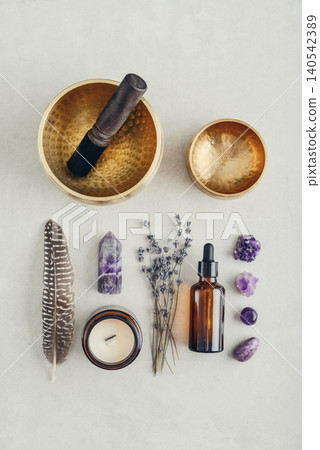 Holistic healing and mindfulness concept associated with meditation, aromatherapy, sound therapy, energy balance, relaxation rituals, massage treatments, and spiritual self-care. Holistic healing and mindfulness concept associated with meditation, aromatherapy, sound therapy, energy balance, relaxation rituals, massage treatments, and spiritual self-care. 140542389