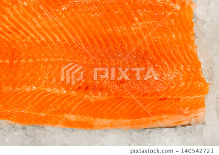 Salmon fillet raw fresh fish seafood texture pattern sea orange food background Salmon fillet raw fresh fish seafood texture pattern sea orange food background 140542721
