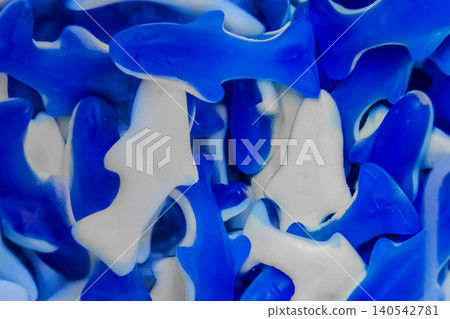 Gummies jelly sweet sugar marmalade white food object blue background candy gelatin Gummies jelly sweet sugar marmalade white food object blue background candy gelatin 140542781