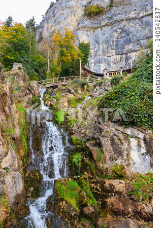 St. Beatus Waterfall at St. Beatus Caves entrance in Beatenberg, Bernese Oberland, Switzerland St. Beatus Waterfall at St. Beatus Caves entrance in Beatenberg, Bernese Oberland, Switzerland 140542837