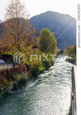View of the Aare river at autumn in Interlaken, Switzerland View of the Aare river at autumn in Interlaken, Switzerland 140542847