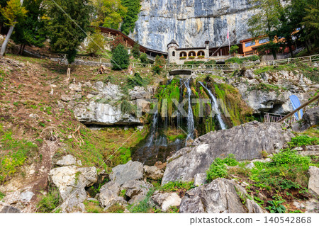 St. Beatus Waterfall at St. Beatus Caves entrance in Beatenberg, Bernese Oberland, Switzerland St. Beatus Waterfall at St. Beatus Caves entrance in Beatenberg, Bernese Oberland, Switzerland 140542868