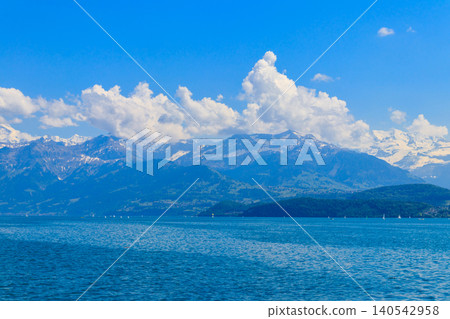 View of the Annecy lake surrounded by beautiful mountains in Annecy, France 140542958