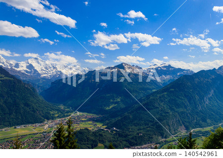 Breathtaking aerial view of Interlaken and Swiss Alps from Harder Kulm viewpoint, Switzerland Breathtaking aerial view of Interlaken and Swiss Alps from Harder Kulm viewpoint, Switzerland 140542961