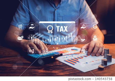 Tax concept. Businessman Using Calculator for Tax Preparation with Digital Interface and Financial Reports on Table Tax concept. Businessman Using Calculator for Tax Preparation with Digital Interface and Financial Reports on Table 140543738