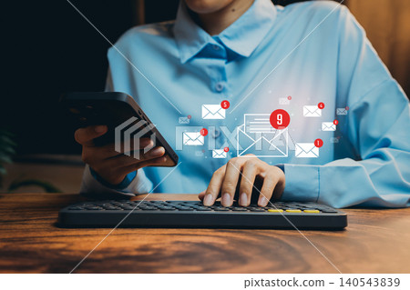 Email management concept. Person using smartphone and keyboard with notification icons, inbox overload, digital communication, productivity control, message organization, business workflow efficiency. Email management concept. Person using smartphone and keyboard with notification icons, inbox overload, digital communication, productivity control, message organization, business workflow efficiency. 140543839