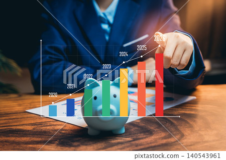 Saving money growth concept. Piggy bank with financial bar chart from 2020 to 2026 showing increasing income, investment success, and personal finance planning strategy Saving money growth concept. Piggy bank with financial bar chart from 2020 to 2026 showing increasing income, investment success, and personal finance planning strategy 140543961
