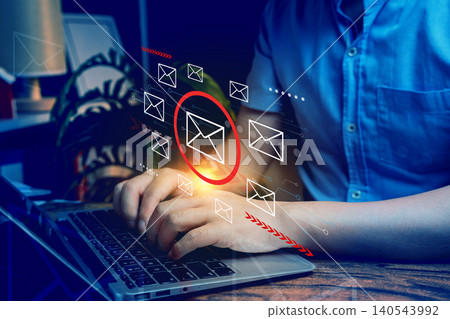 Digital communication, person typing on laptop with email icons interface, email marketing and cybersecurity risk concept 140543992