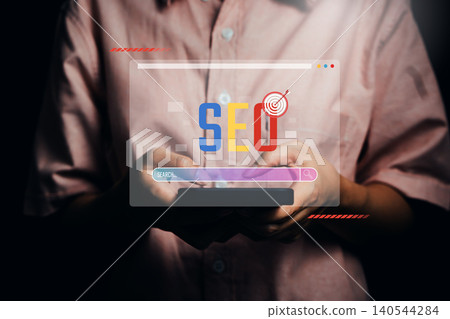 Person using smartphone with SEO search bar, website ranking, digital marketing, organic traffic growth, branding, search engine optimization success concept 140544284