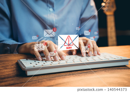 Email scam warning concept. User typing on keyboard with phishing alert message, cyber security awareness, online fraud prevention, data protection and digital safety. Email scam warning concept. User typing on keyboard with phishing alert message, cyber security awareness, online fraud prevention, data protection and digital safety. 140544373