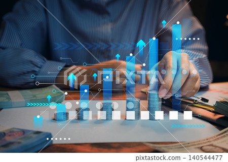 Financial growth strategy, hand stacking coins with rising business graph overlay, investment performance and long term wealth accumulation Financial growth strategy, hand stacking coins with rising business graph overlay, investment performance and long term wealth accumulation 140544477