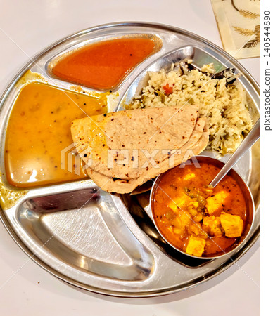 Traditional Indian Thali with Dal, Rice, and Roti Traditional Indian Thali with Dal, Rice, and Roti 140544890