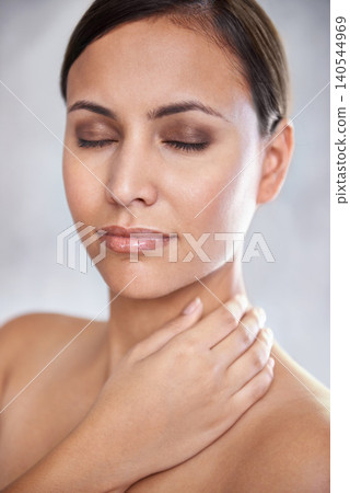 Woman, makeup and relax with eyes closed for beauty, cosmetic benefits and shine for wellness. Salon, spa and female person with eye shadow for self care, facial glow and skincare for dermatology Woman, makeup and relax with eyes closed for beauty, cosmetic benefits and shine for wellness. Salon, spa and female person with eye shadow for self care, facial glow and skincare for dermatology 140544969