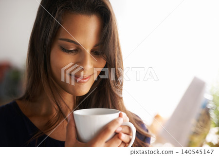 Face, woman and home with coffee in smile for break with leisure in happiness, satisfied and self care. Closeup, female person and house with cup in morning to relax for positive mind and enjoy Face, woman and home with coffee in smile for break with leisure in happiness, satisfied and self care. Closeup, female person and house with cup in morning to relax for positive mind and enjoy 140545147