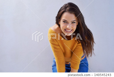 Woman, smile and mockup with happy, playful and proud with sweater for comfort. Model, fashion and positive with natural, fun and confidence for trendy style meme isolated on white wall background Woman, smile and mockup with happy, playful and proud with sweater for comfort. Model, fashion and positive with natural, fun and confidence for trendy style meme isolated on white wall background 140545243