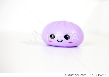 Purple kawaii squishy dumpling antistress toy on white background Purple kawaii squishy dumpling antistress toy on white background 140545253