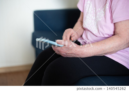 Senior woman hands using smartphone for communication Senior woman hands using smartphone for communication 140545262
