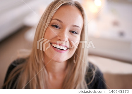 Happy, portrait and woman in a house relax with confidence, positive attitude or feel good mood in her home. Face, smile and female person in a living room with vacation, free time or resting holiday Happy, portrait and woman in a house relax with confidence, positive attitude or feel good mood in her home. Face, smile and female person in a living room with vacation, free time or resting holiday 140545373